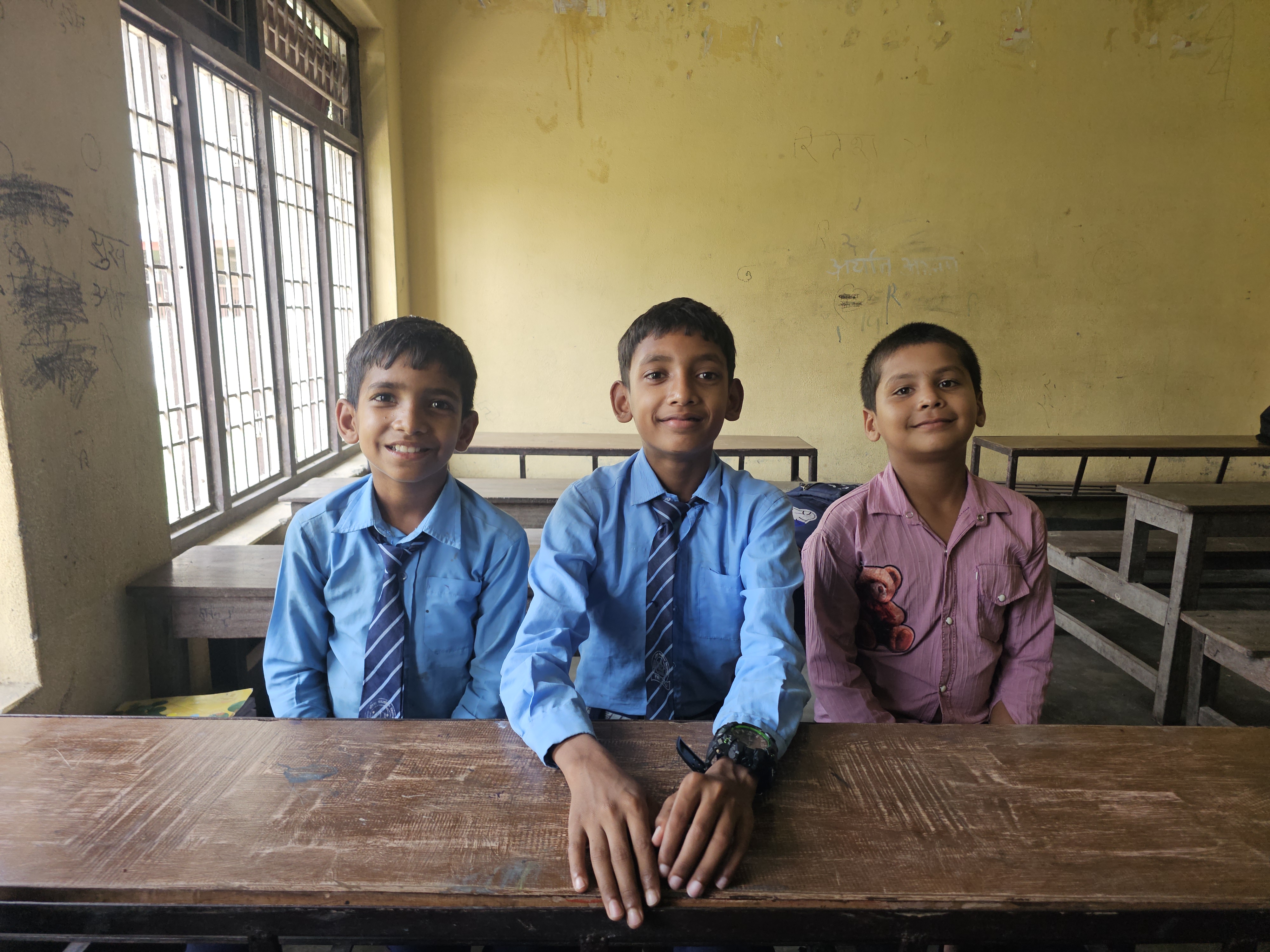 Three students at desk